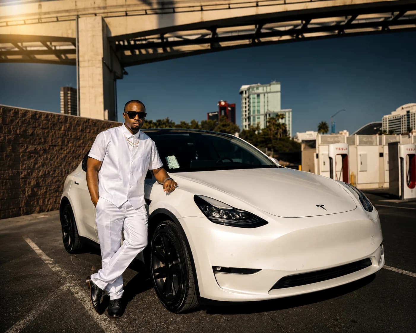 Jerome Smith in a white suit, an unmistakable sense of arrival.